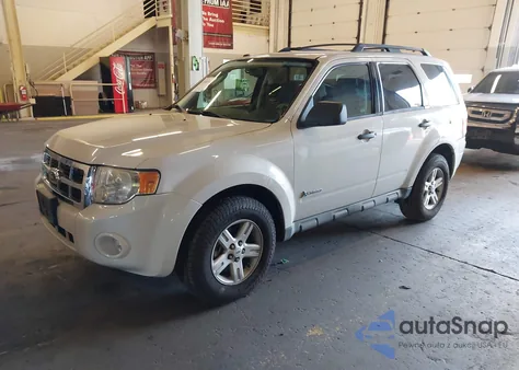 2009 Ford Escape Hybrid из США, поврежденный, VIN 1FMCU59319KB25744